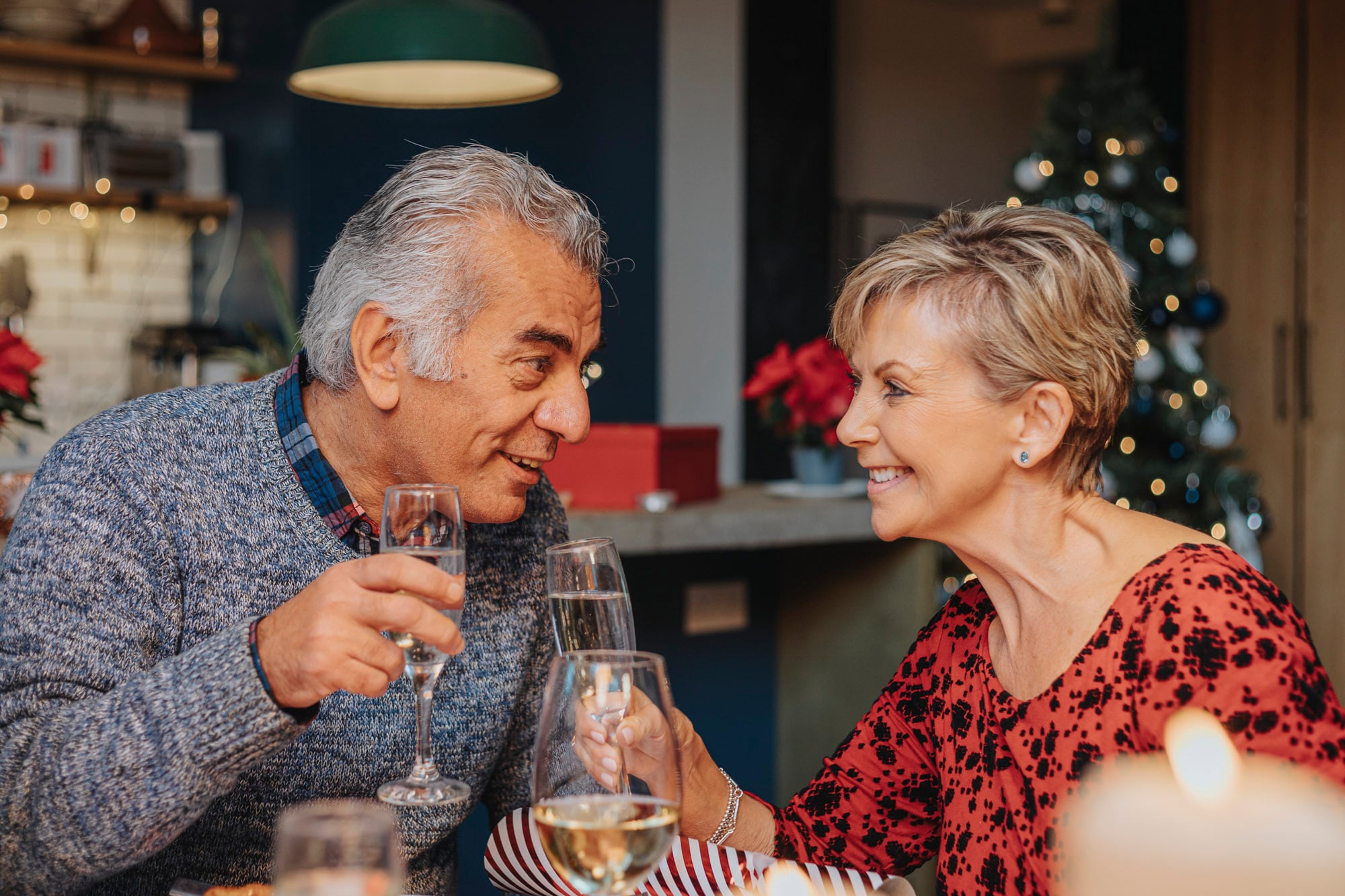 Hidden Hearing brand photography — older couple embracing outdoors